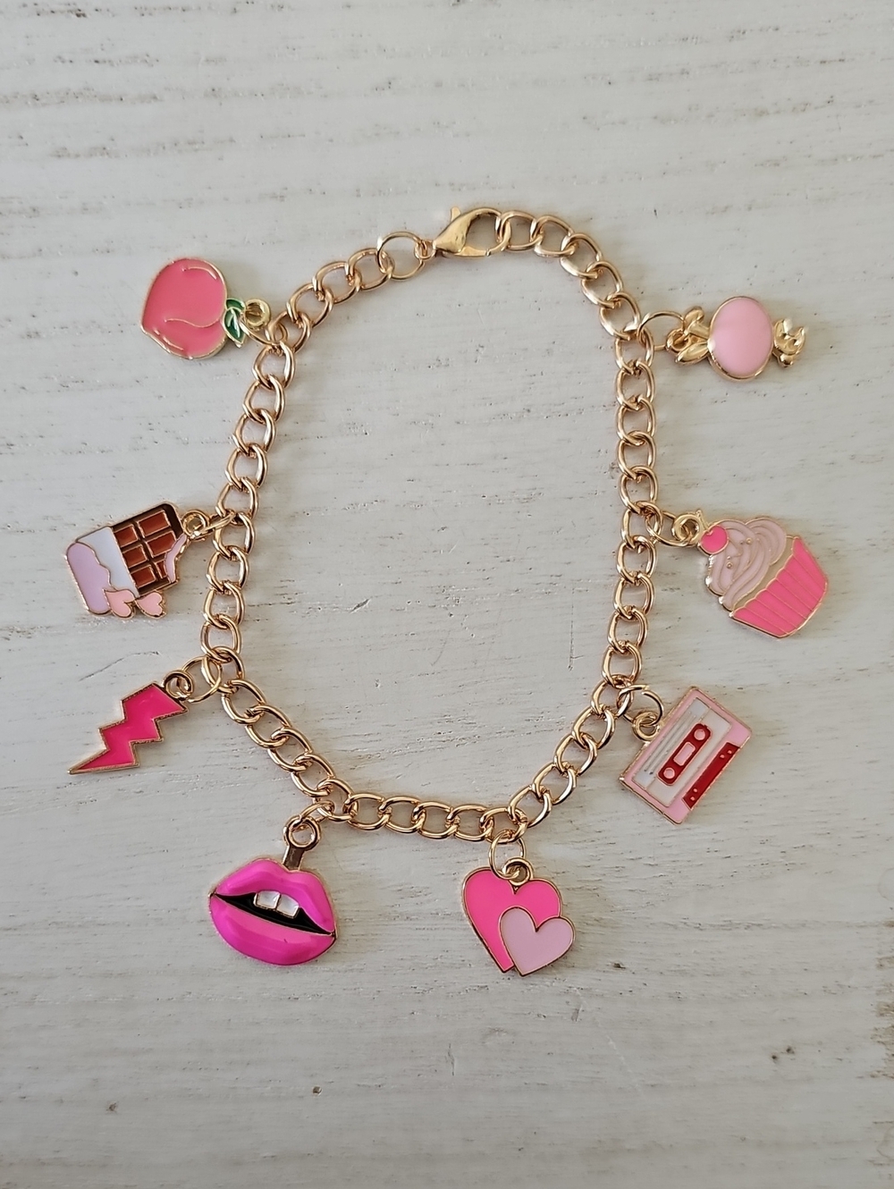Gold-Tone Charm Bracelet with Pink Accents
